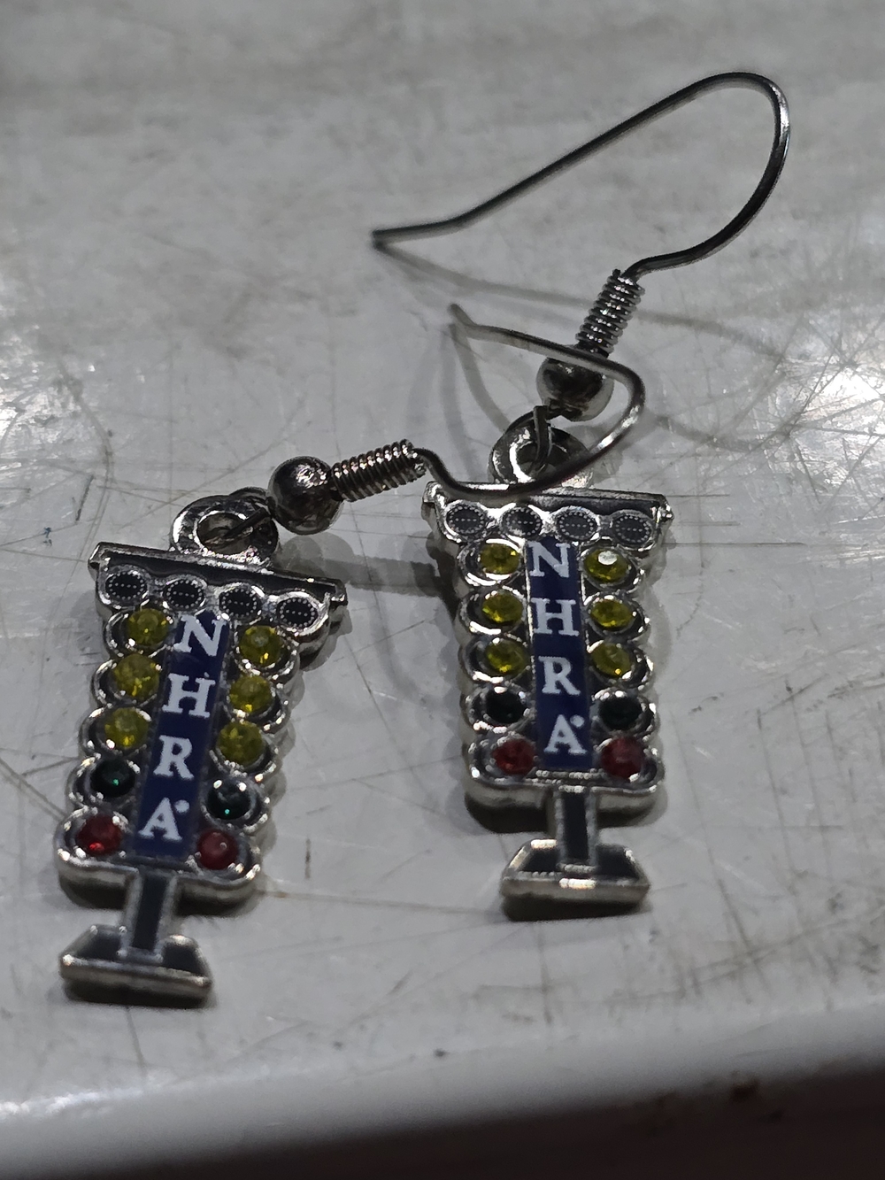NHRA Silver Tumbler Dangle Earrings with Multicolor Rhinestones
